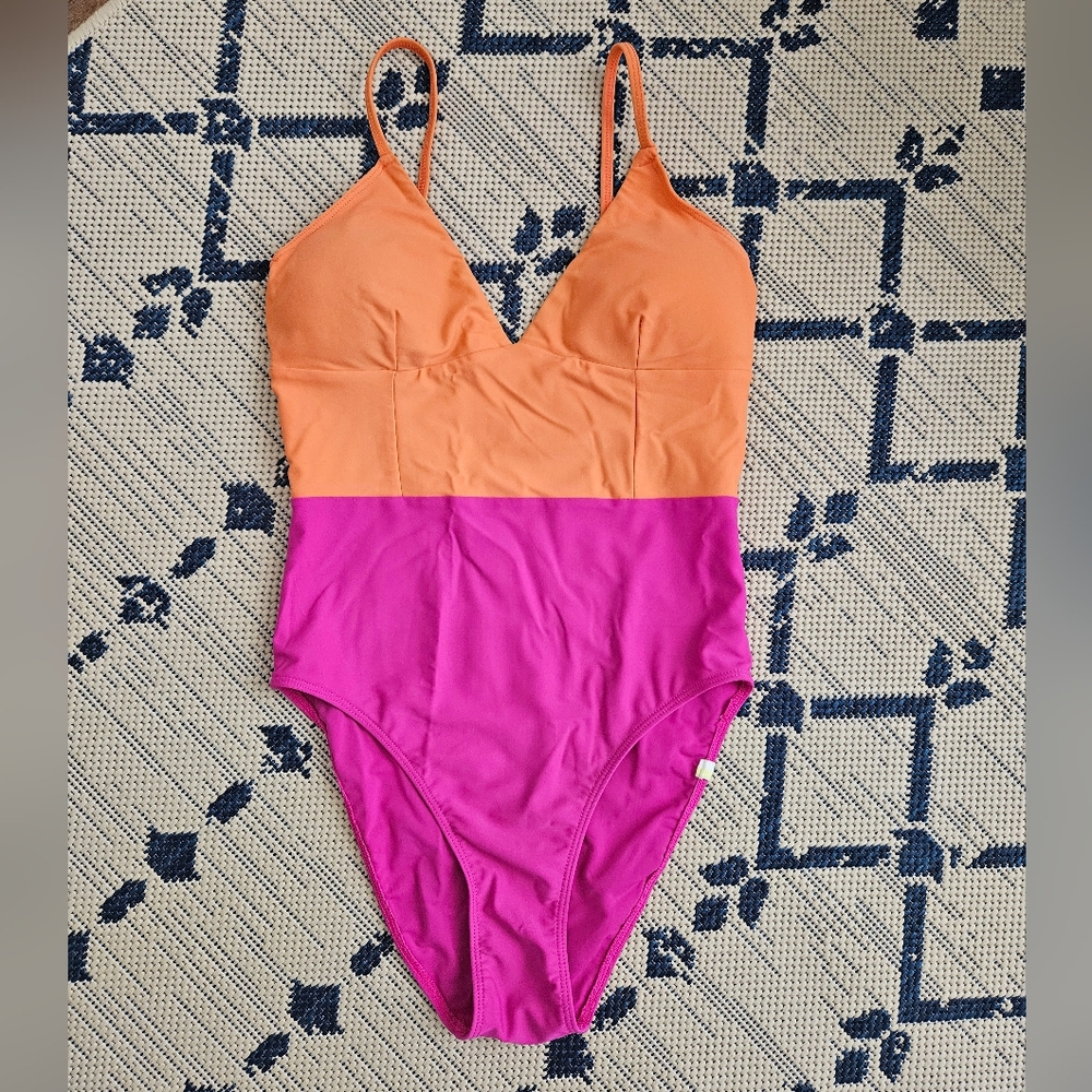Summersalt One piece In Hibiscus And Tangerine.